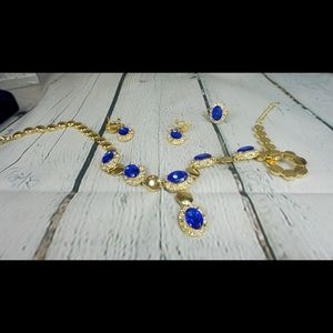 Gold and Sapphire Jewelry set. Never used.